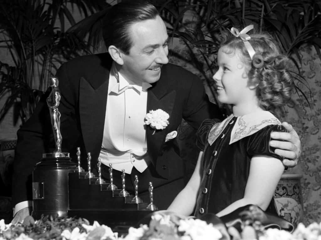 Walt Disney receiving the Oscar for Snow White